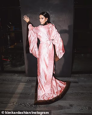 She highlighted a series of photos showing off the baby pink kimono with brown trim and the embroidered letters AG on her waist for her character's name Allura Grant