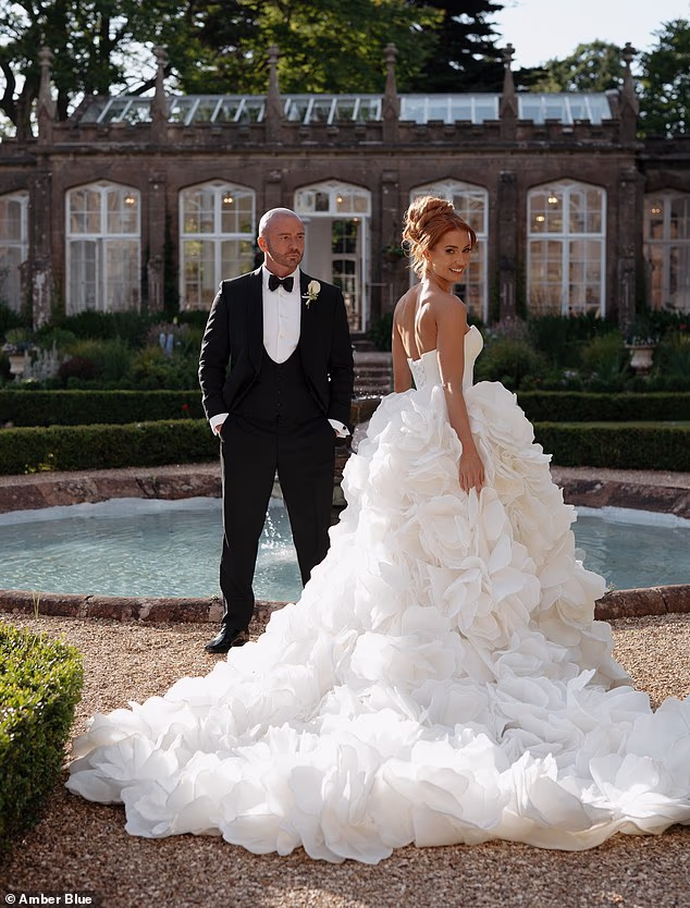 Sophie was every inch the blushing bride in the strapless garment