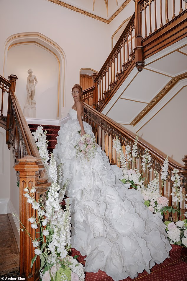 Sophie's impressive gown billowed out behind her in the snaps
